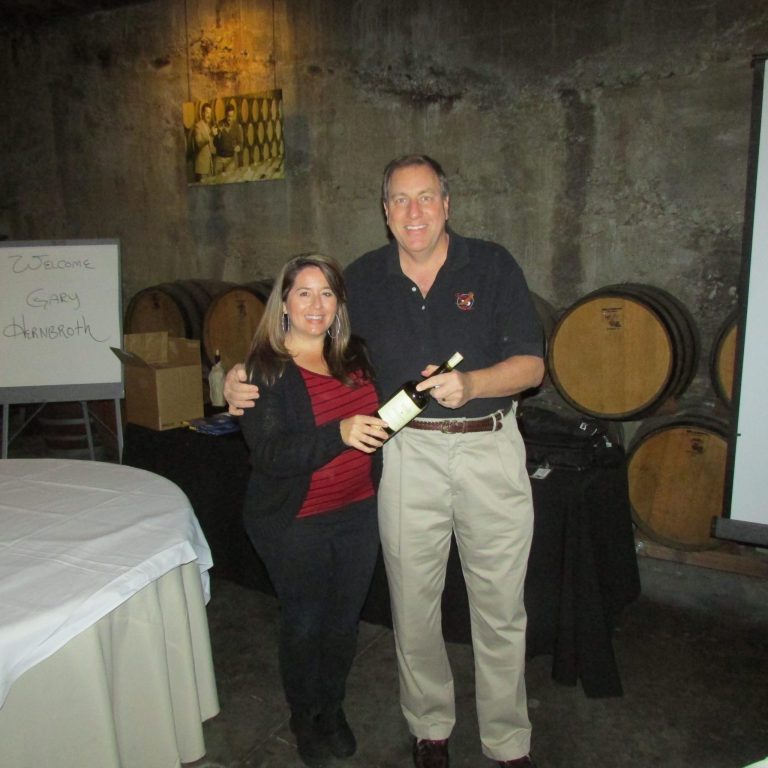 Wente Vineyards presents Gary with an excellent vintage after his sales training workshop in their barrel room