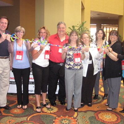 Teams get a “twist” on their notetaking and goal-setting when working with Gary. These managers show off their notes turned into “yardsticks for success.”